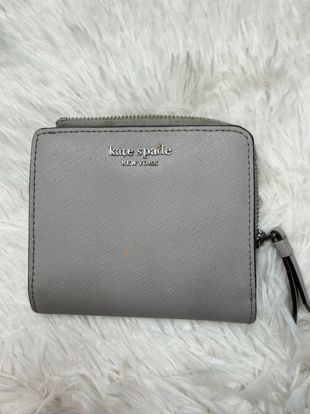 kate spade New York light gray Saffiano zip wallet